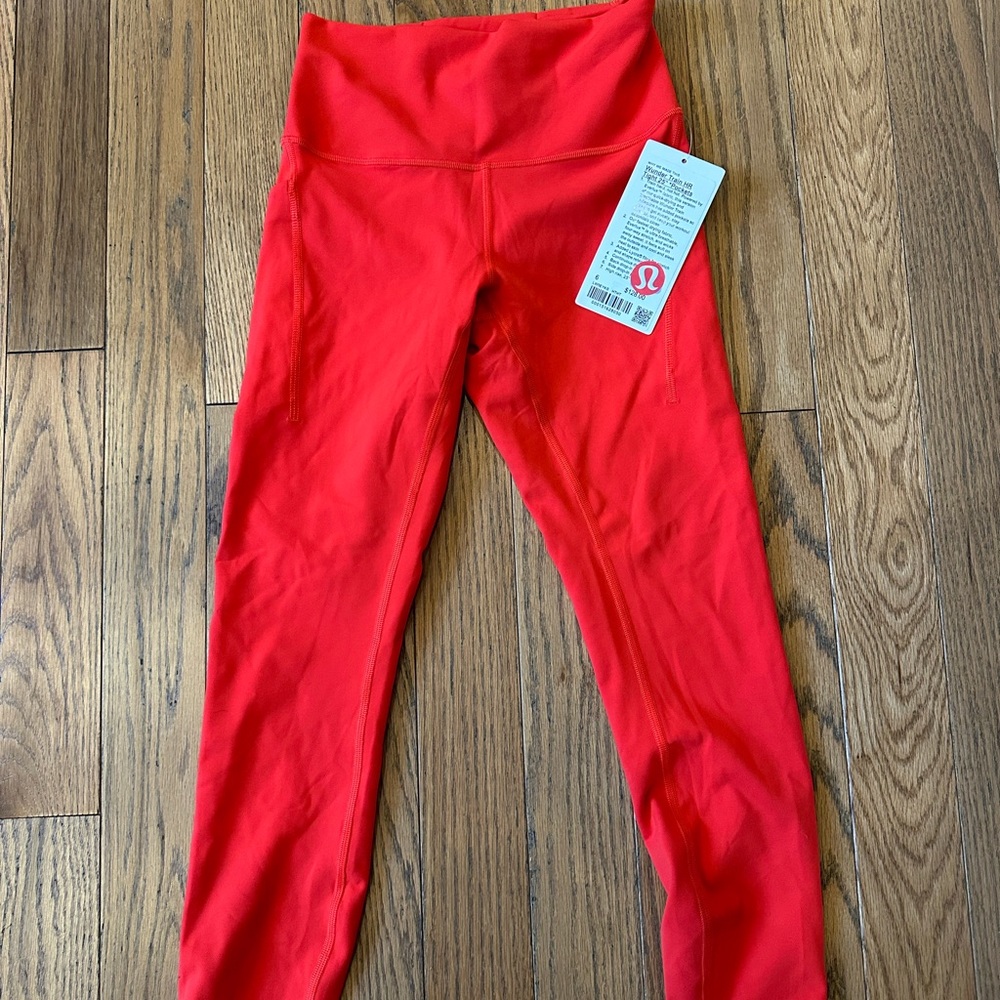 Lululemon Wunder Train with pockets Hot Heat size 6